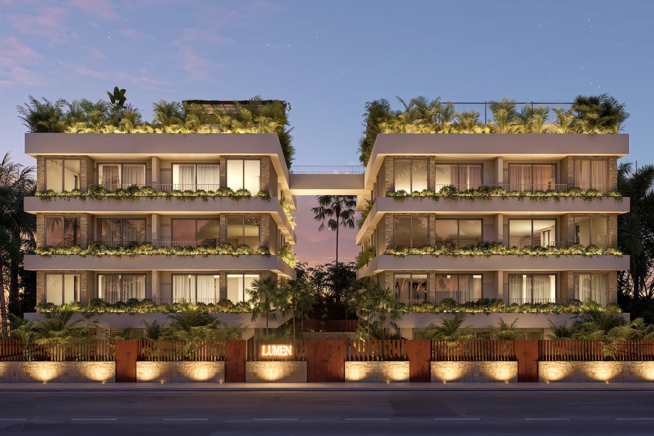 Render of the Lumen Sal façade at dusk, with planted terraces over the street in Santa Maria, Sal